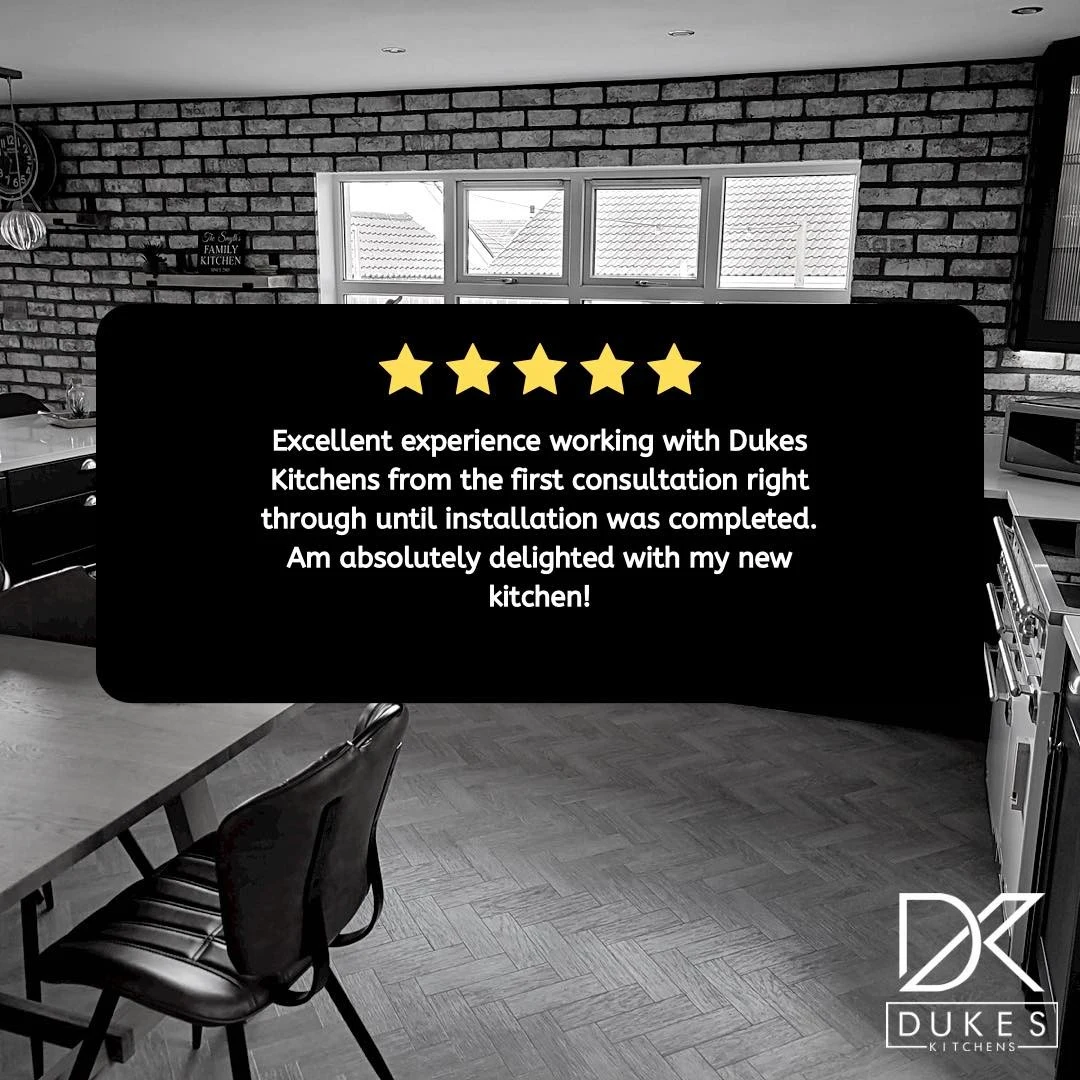 Derry Shaker kitchen with exposed brick, herringbone flooring and five-star review artwork